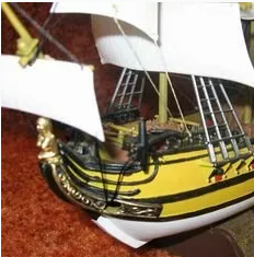 A shot of the original Black Falcon's topless woman figurehead
