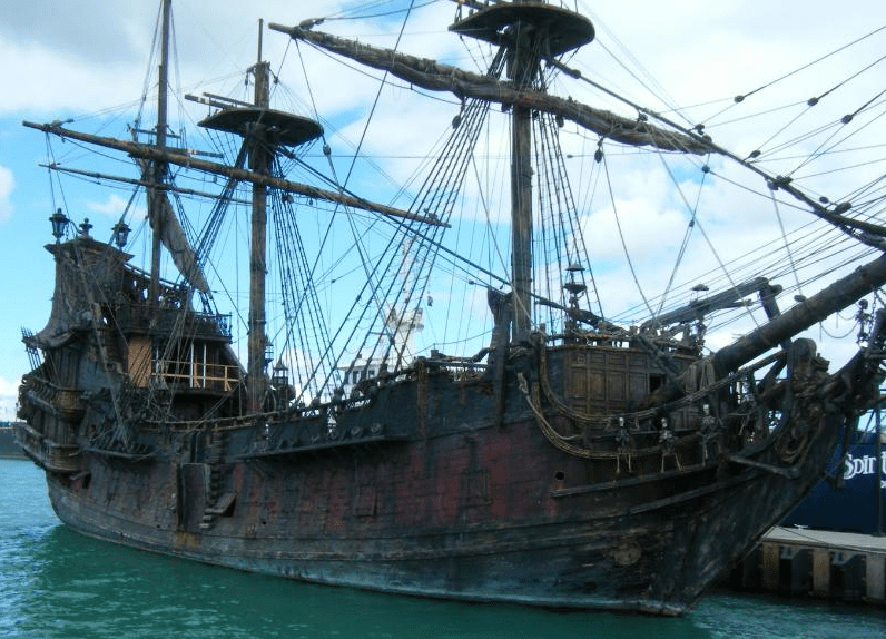 A photo of a very-rough QAR, featuring skeletons on the headrails but plywood and 2x4s across the quarterdeck.